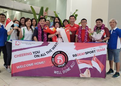 group photo with the SGDeafSport team
